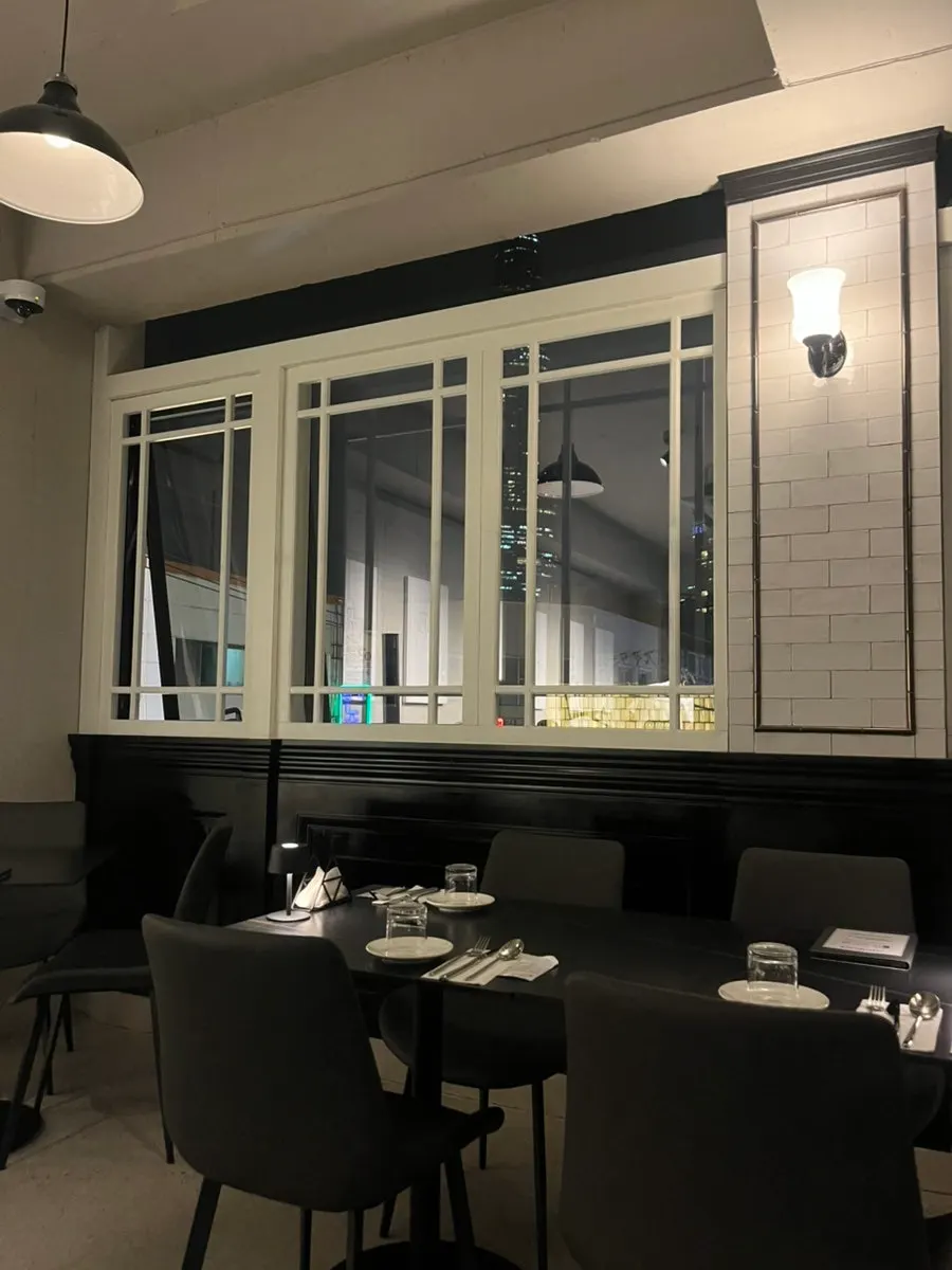 Terrace seating with a view of Lotte Tower