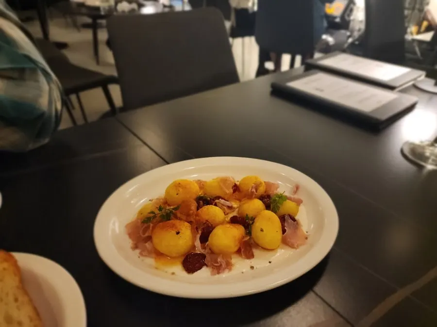 Cross-section of the prosciutto potato salad showing the cream cheese texture