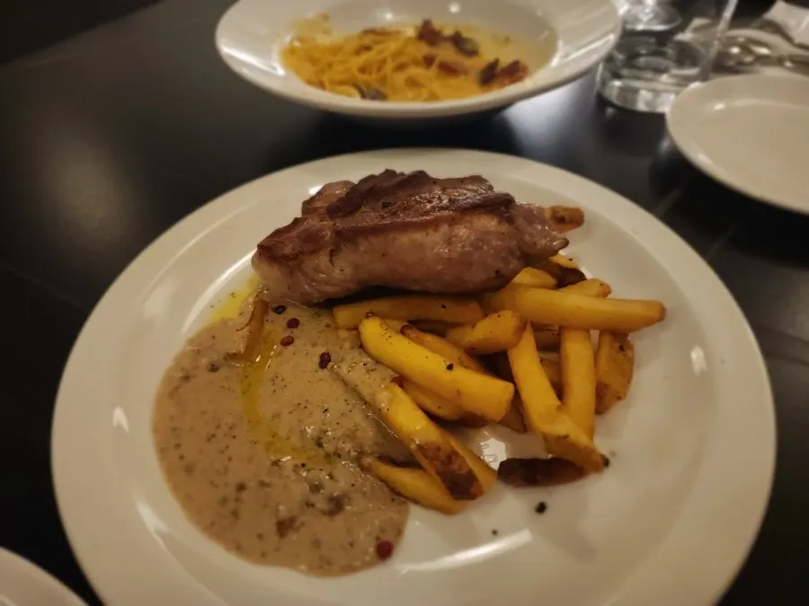 A plate of sous-vide pork shoulder steak