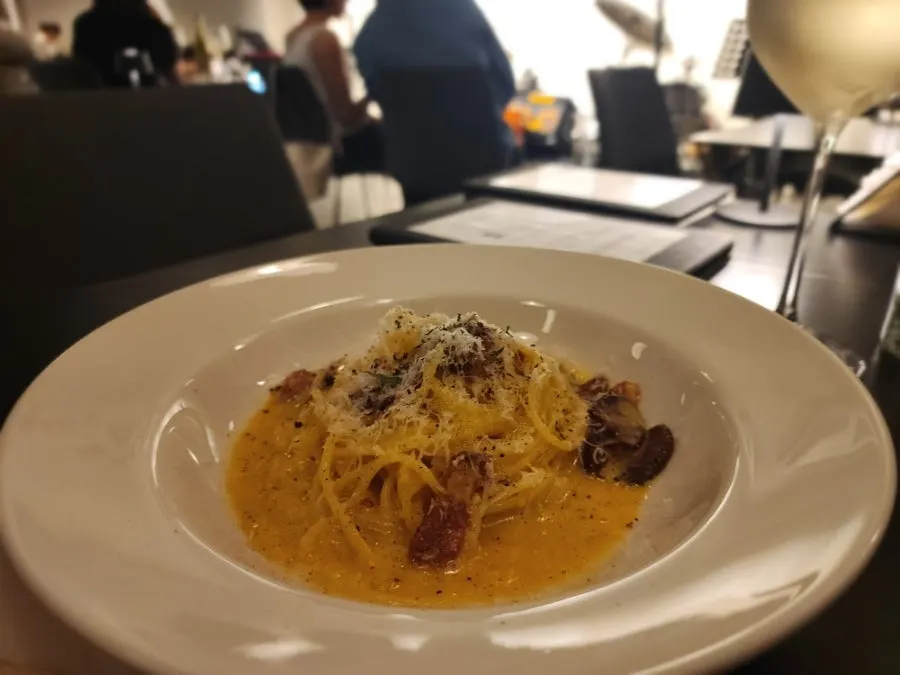 Italian-style carbonara made with guanciale and egg yolk