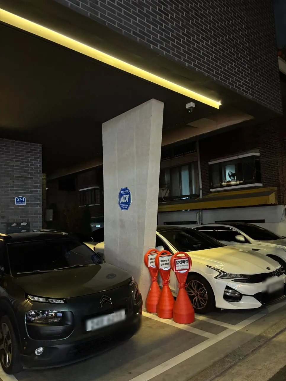 Entrance to the parking lot at the Allegro building