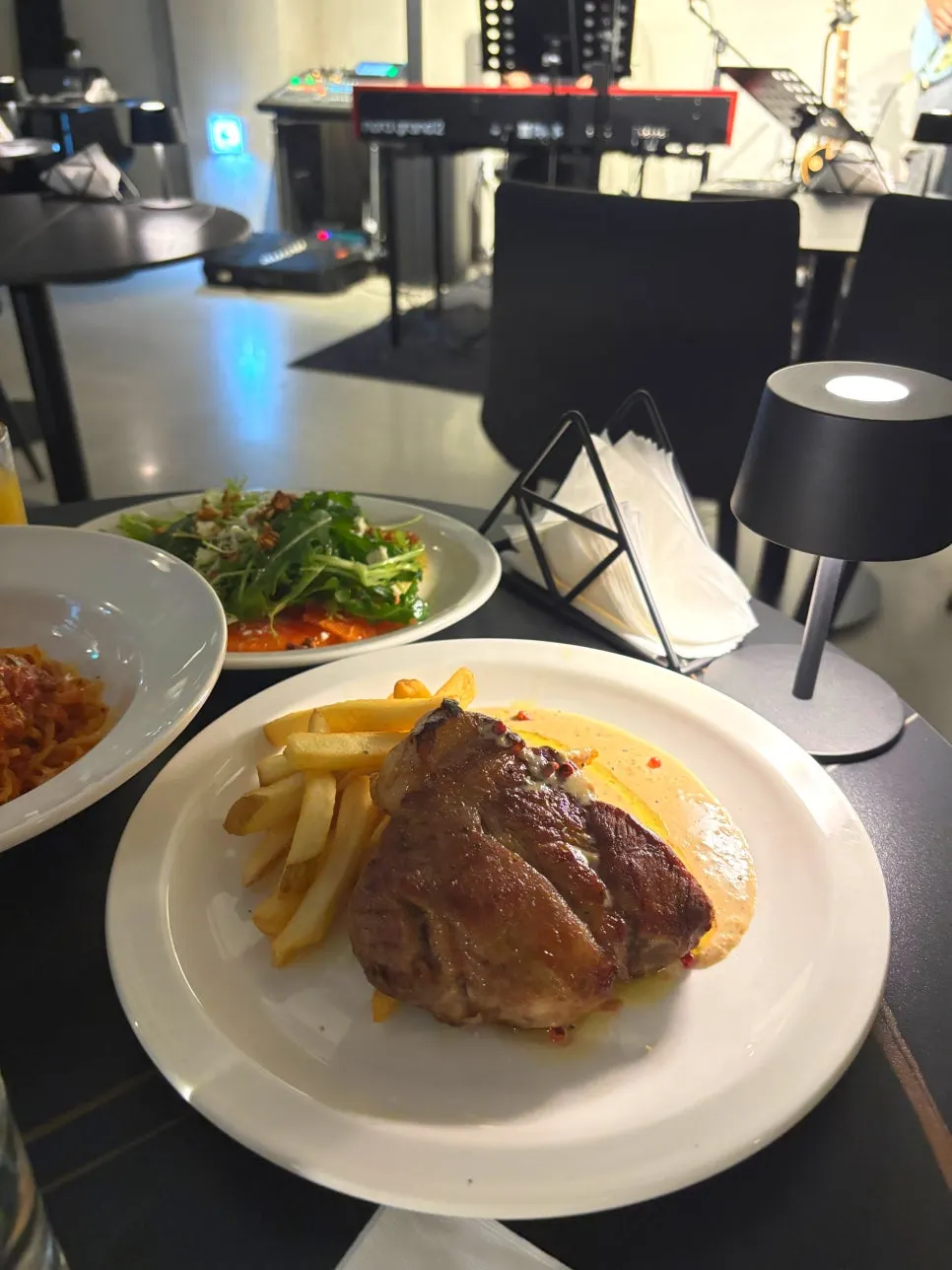 Table setting for Allegro's sous-vide pork shoulder steak