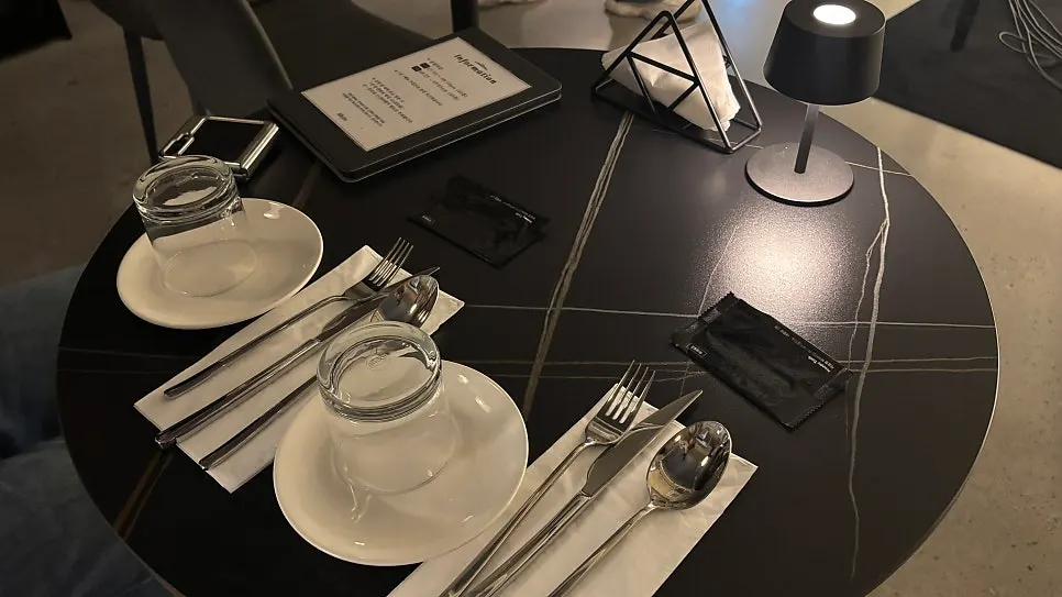 Allegro table setting under soft lighting
