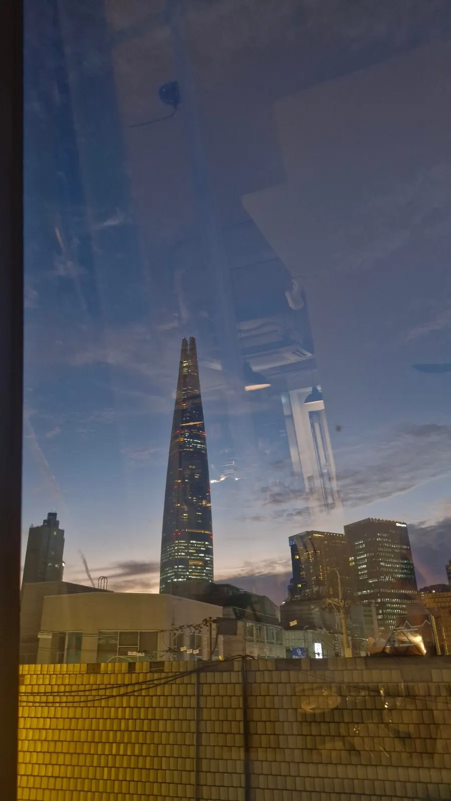Night view of Lotte Tower seen from Allegro's terrace