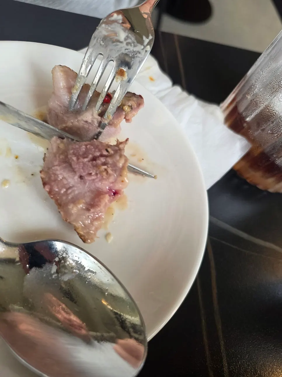 A piece of gnocchi lifted up on a fork