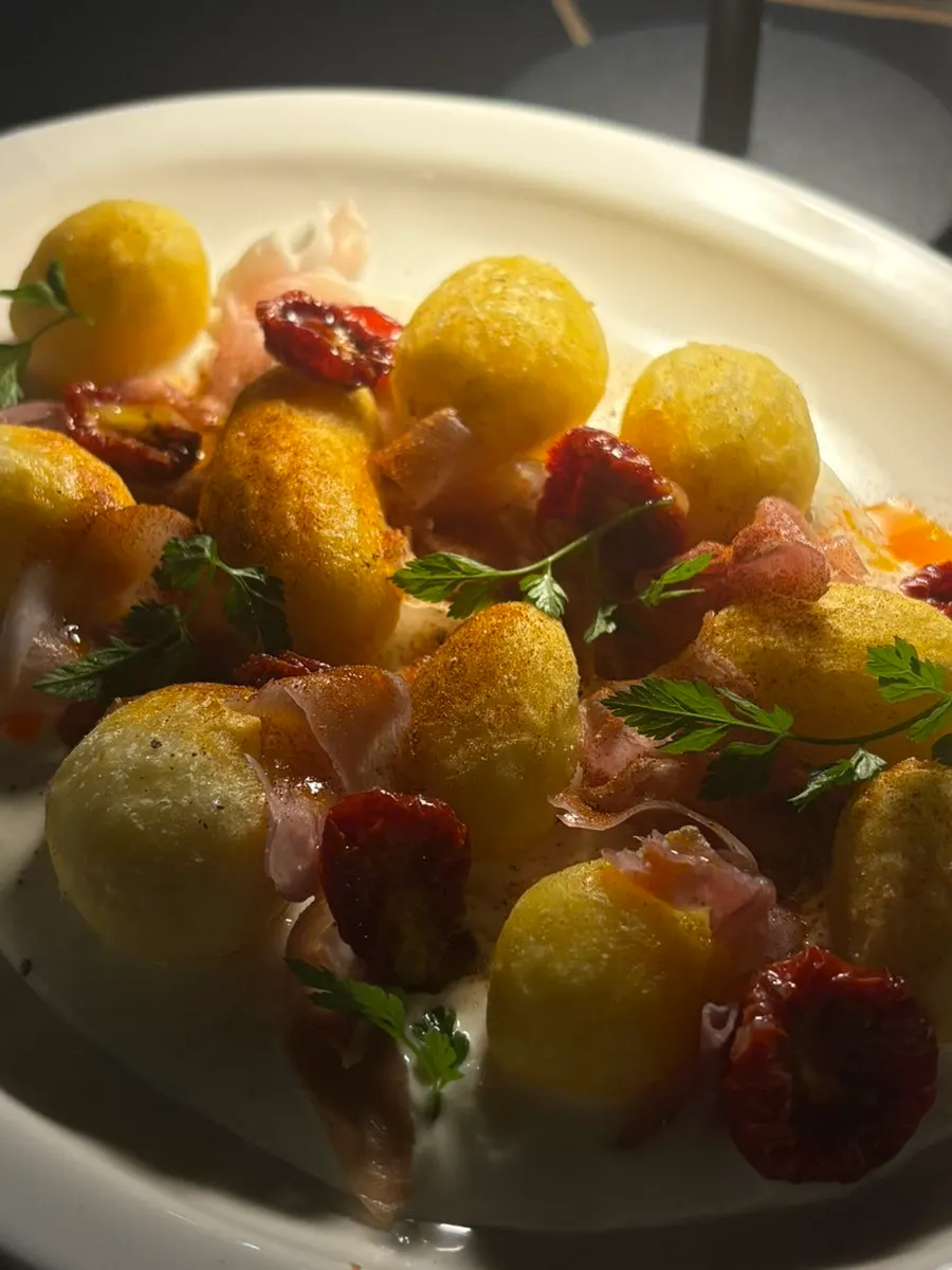 Plate of Allegro's prosciutto potato salad