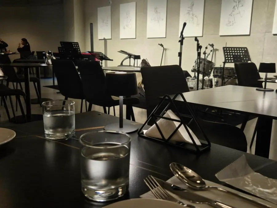 Allegro's interior with the stage and tables