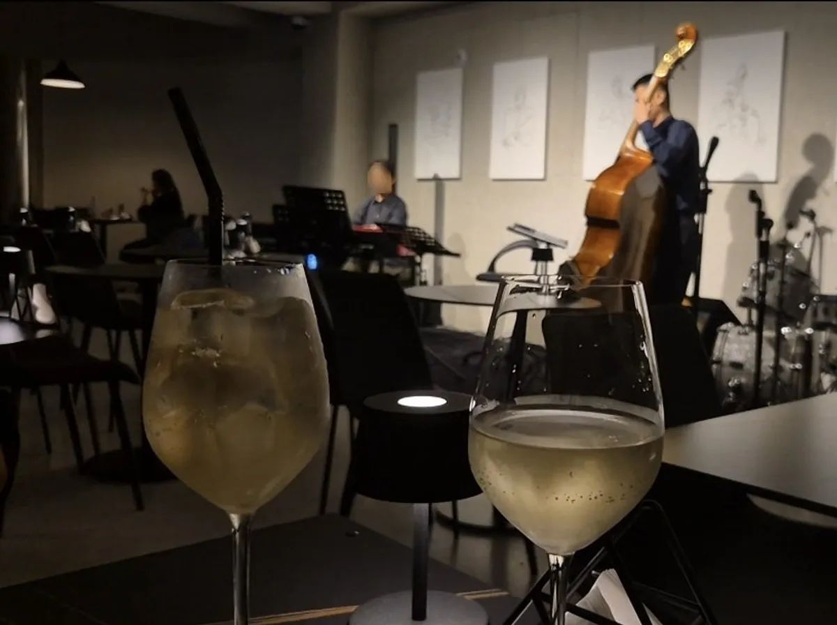 Two glasses — Paisan Sauvignon Blanc and Limoncello Spritz