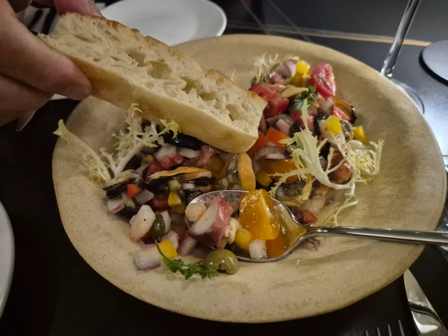 Close-up of the seafood salad tossed in lemon sauce