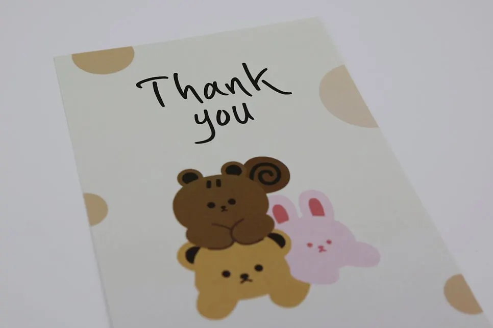 Baby foot warmers delivered with a thank-you card