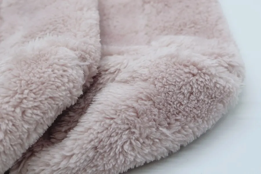 Indie pink baby foot warmers