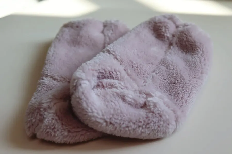 Foot warmer band holding a baby’s leg