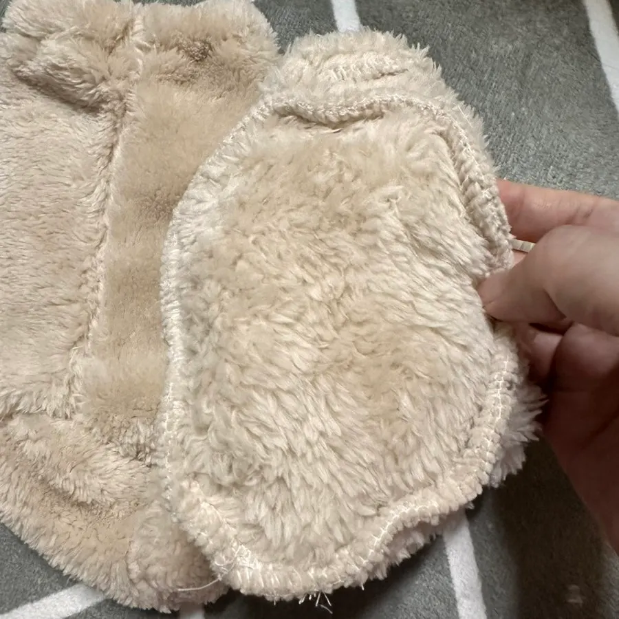 Foot warmer wrapping a baby's feet