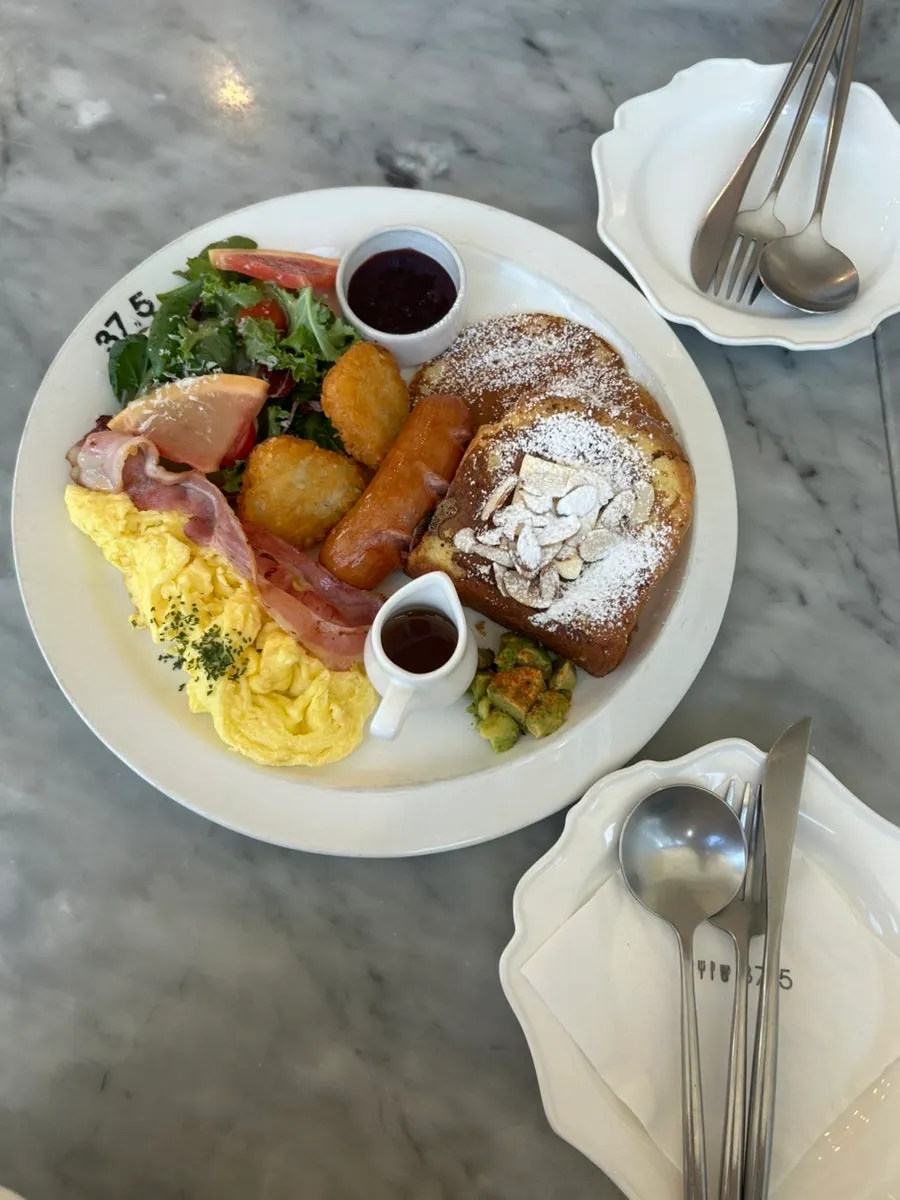 Table set with brunch and pasta dishes