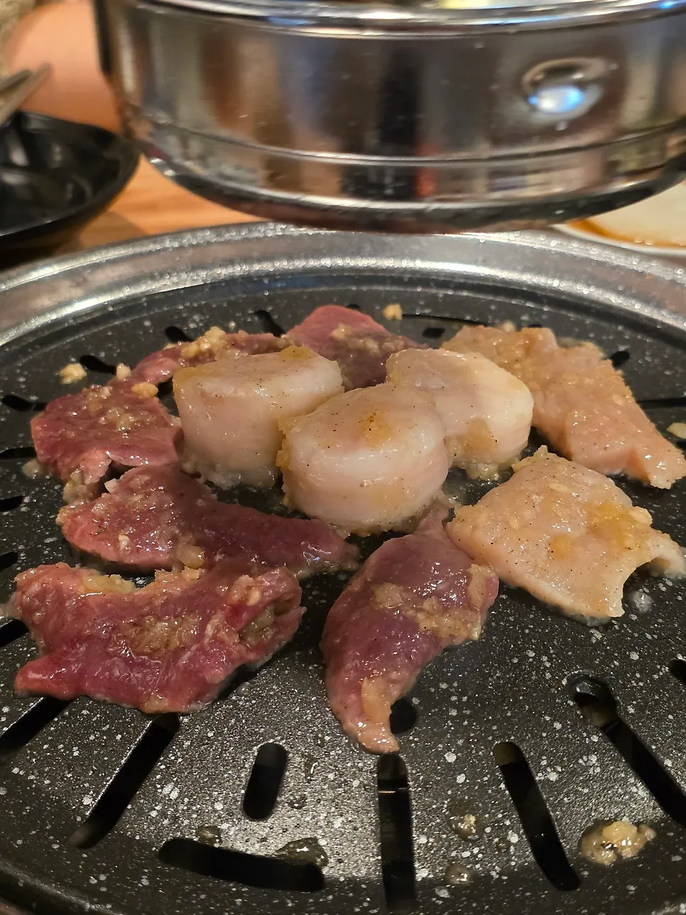 Yanggopchang on the charcoal grill plate