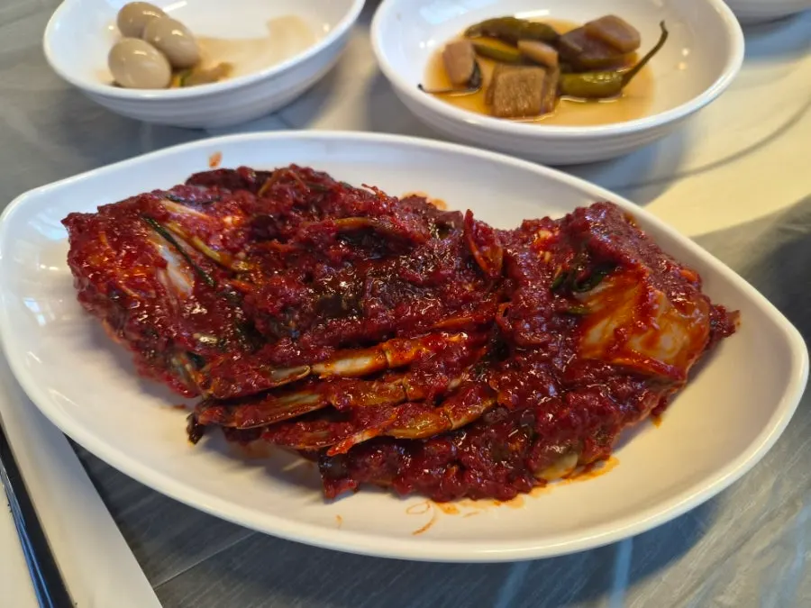 Table spread of 8 side dishes including baechu-jeon
