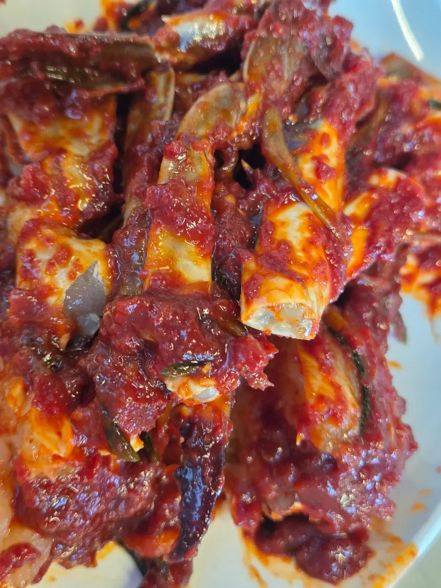 Yangnyeom gejang cut up by the owner for easy eating