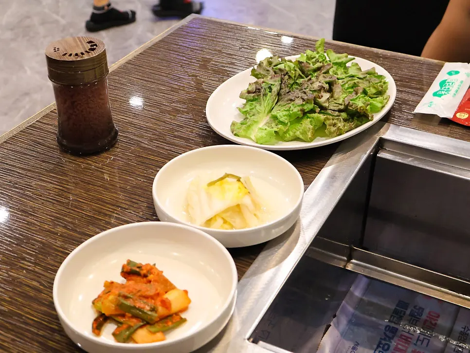 Basic side dishes including pickled ginger and perilla leaves