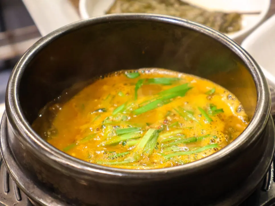 Complimentary eel soup served in a stone pot