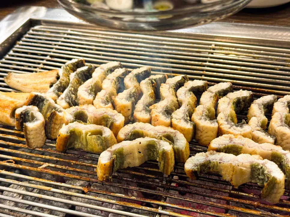 Eel grilling over charcoal