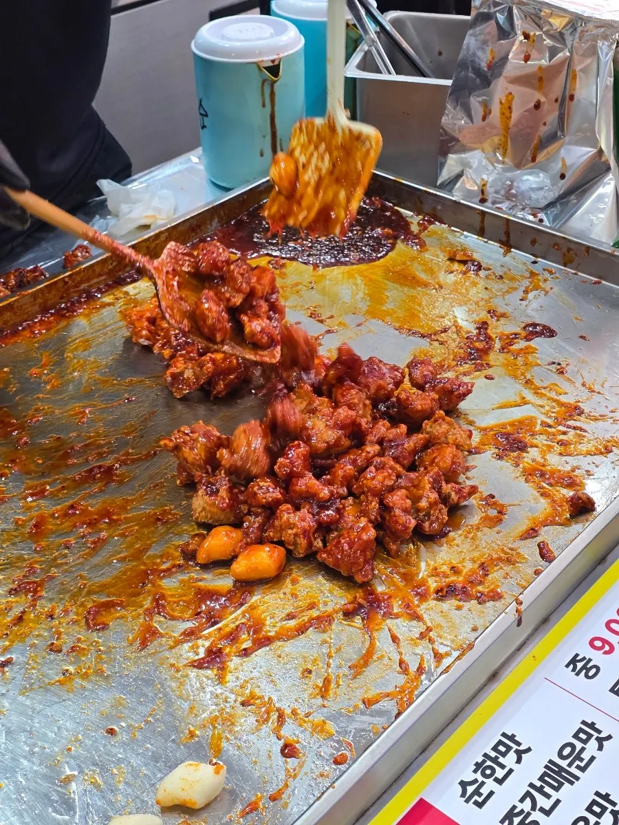 Fried rice cakes tossed together with the dakgangjeong