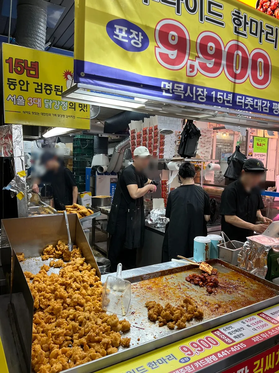 Customers waiting in front of Gimssi Chicken in the evening