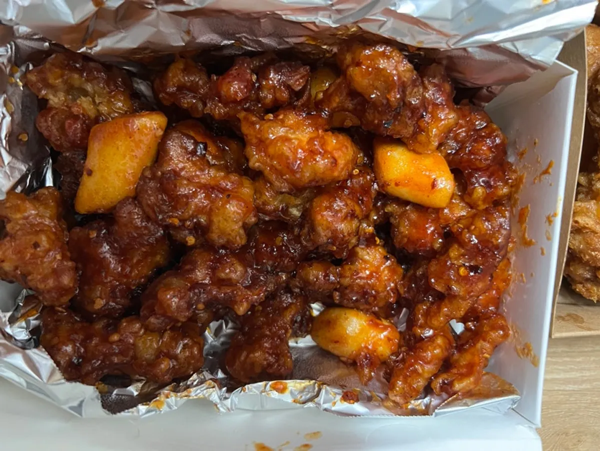 Dakgangjeong box half eaten