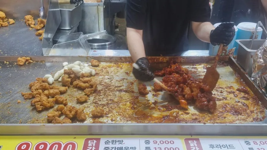 Dakgangjeong evenly coated with sauce