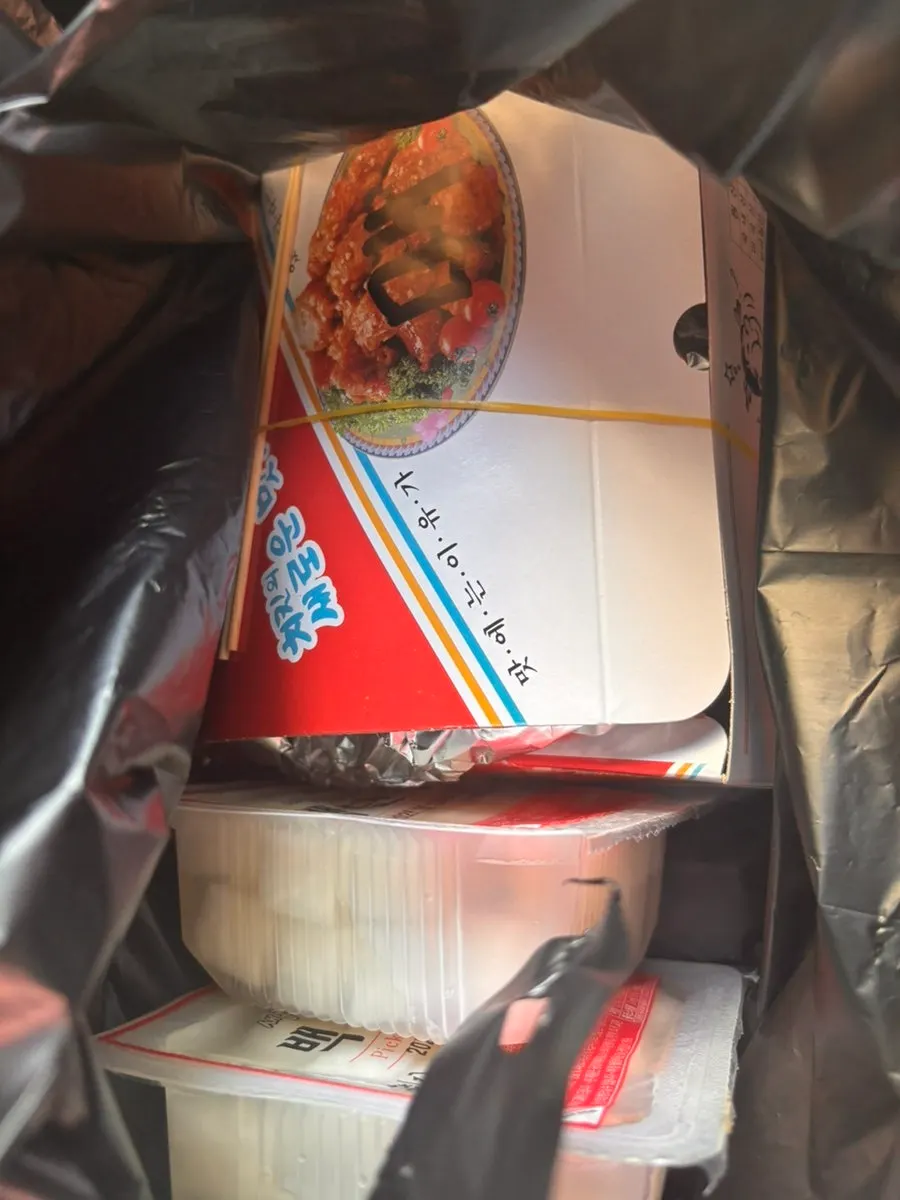 Two tubs of dakgangjeong brought home as takeout