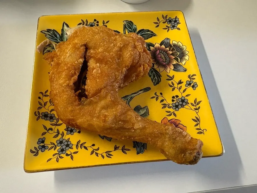 Close-up of dakgangjeong evenly coated in sauce