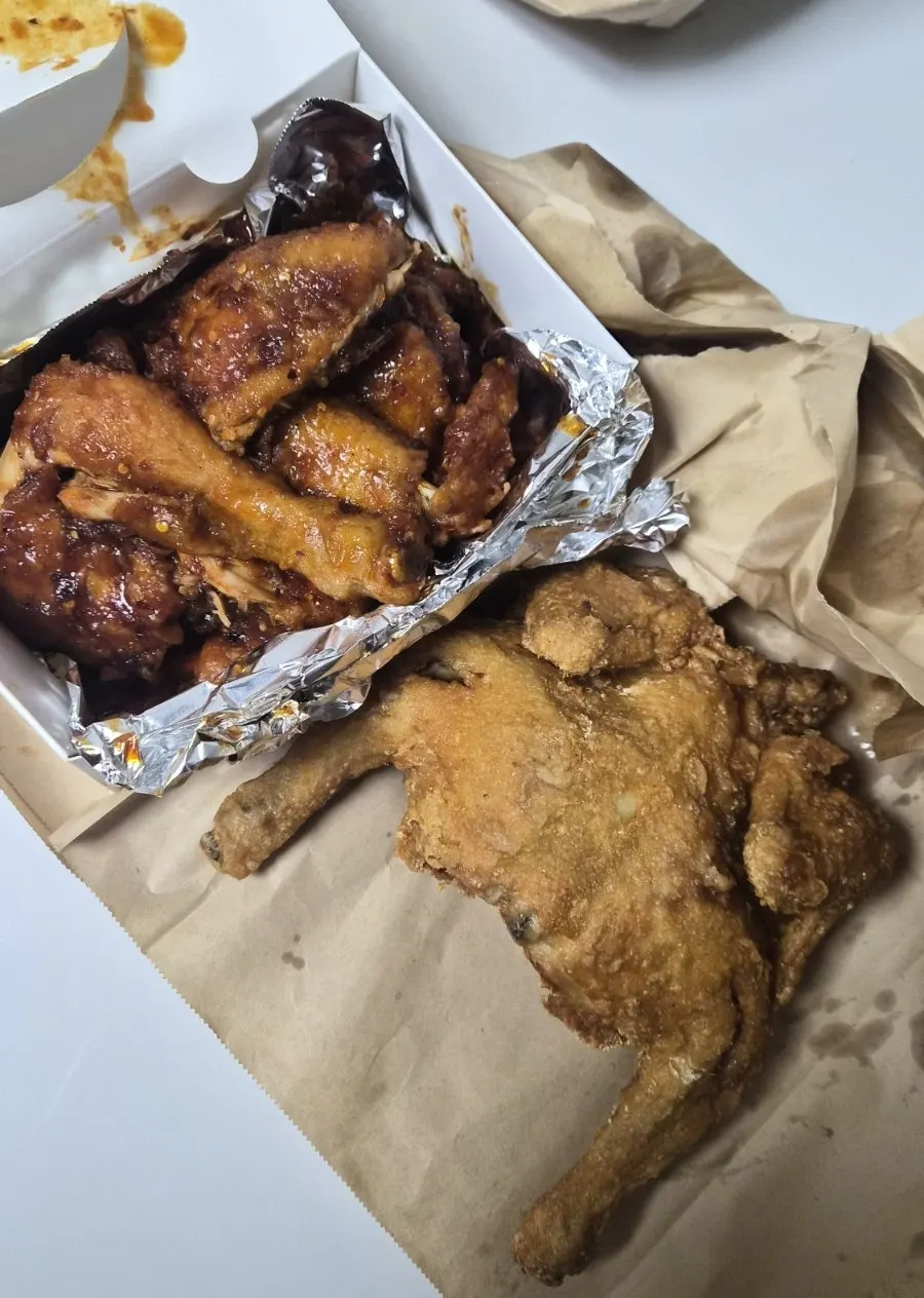 Fried and sauced chicken plated together at home
