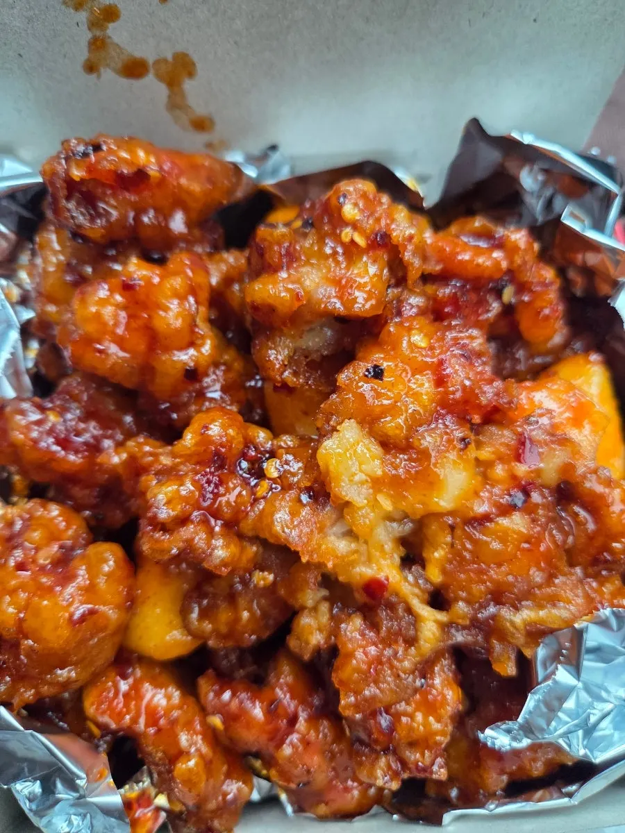 Glossy sauce-coated spicy dakgangjeong