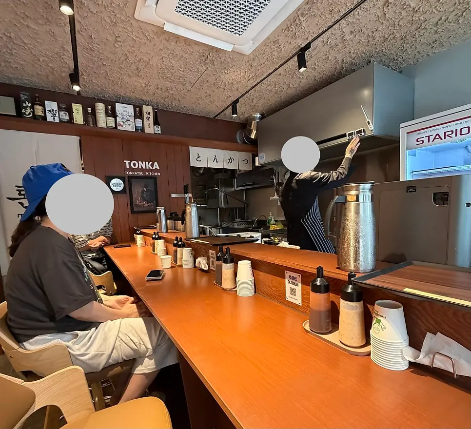 Order screen at Tonka showing tonkatsu and Sapporo bottled beer