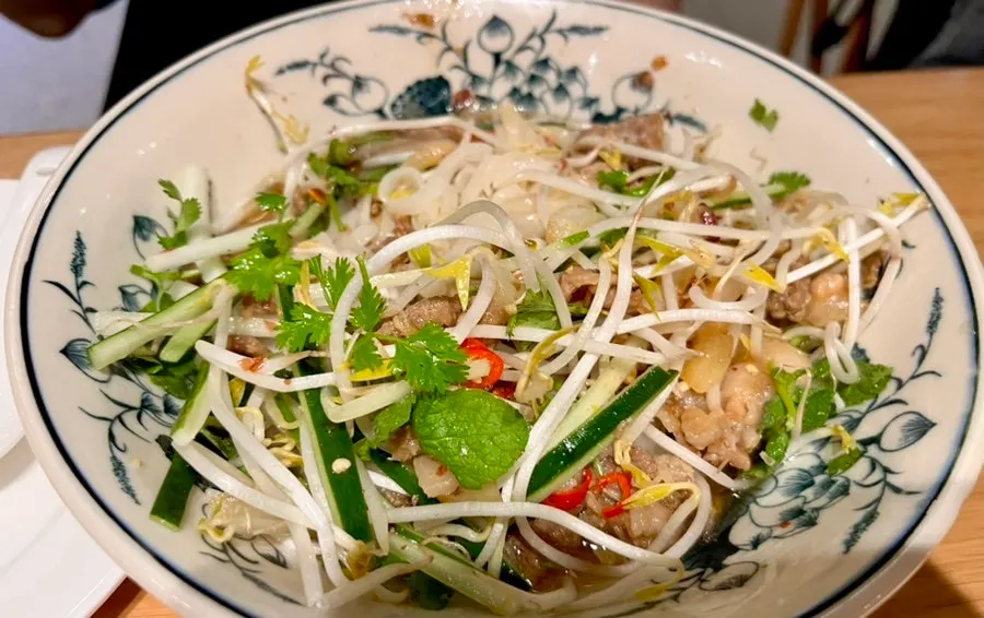 Bean sprouts and crushed peanut topping on bun thit nuong