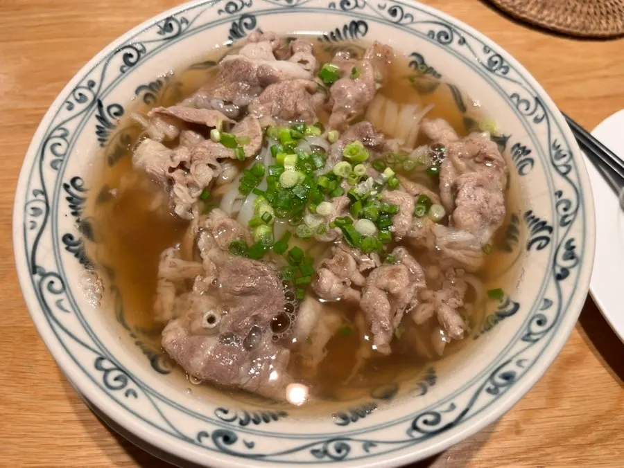 Bun thit nuong with ingredients mixed together