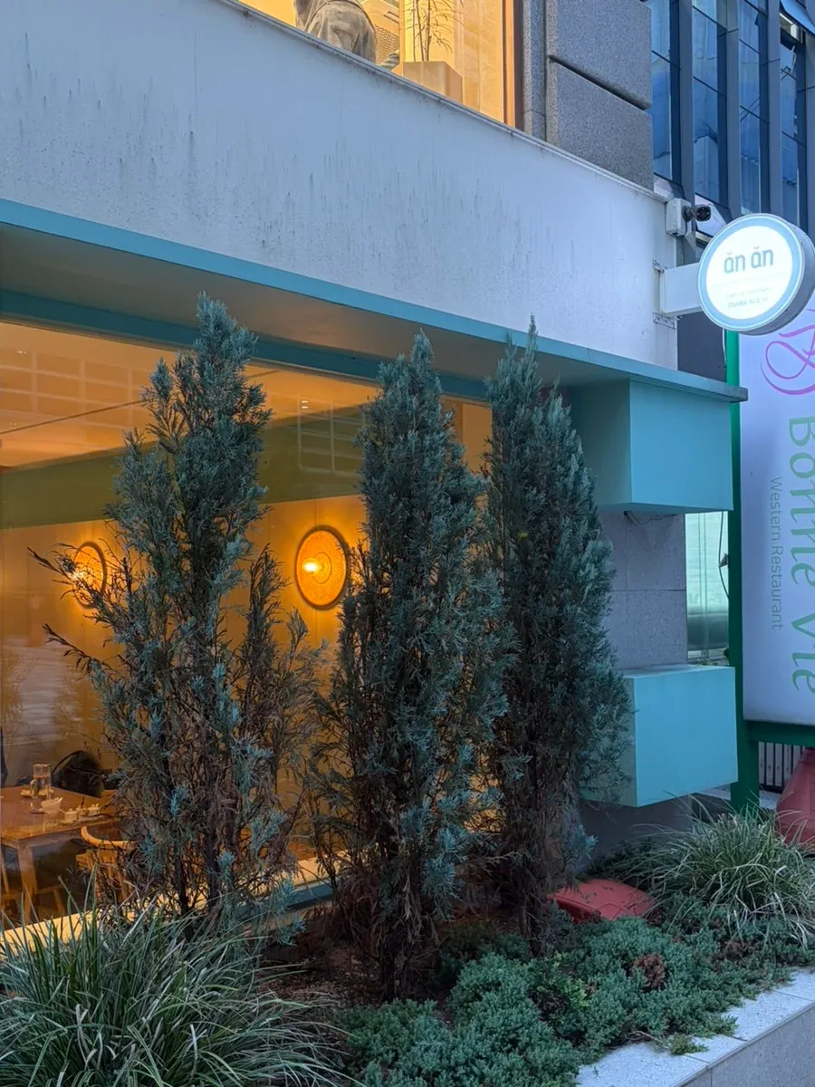 Sky-blue and white exterior of Anan Gangnam Direct Store