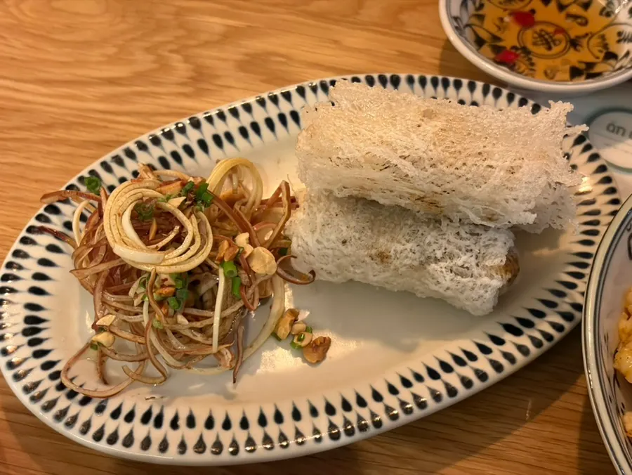A bowl of beef pho eaten with added onions