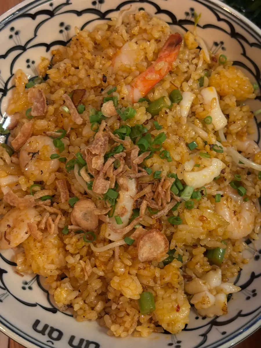 Shrimp seafood fried rice topped with garlic flakes