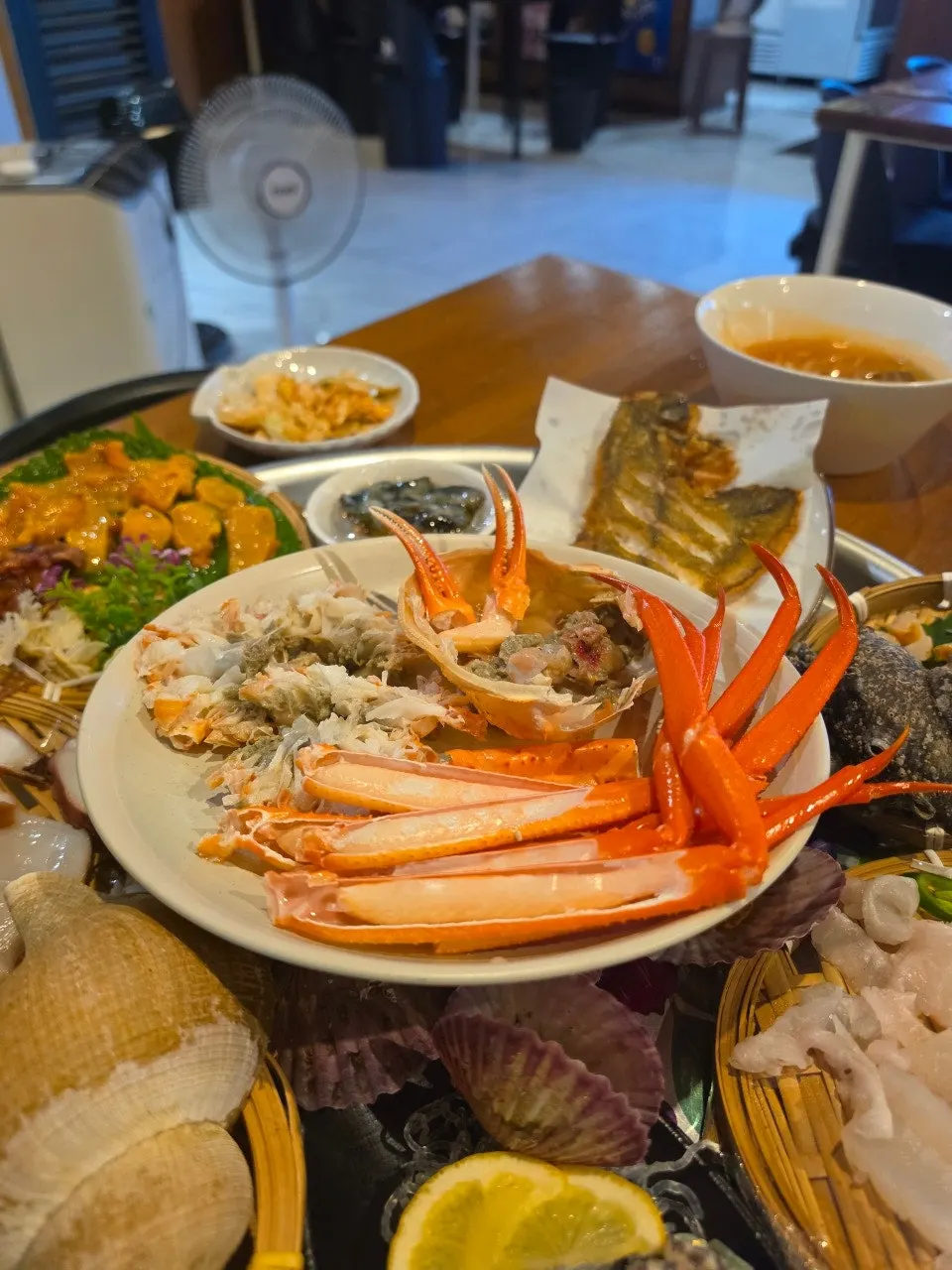 Pre-cleaned snow crab served on the table