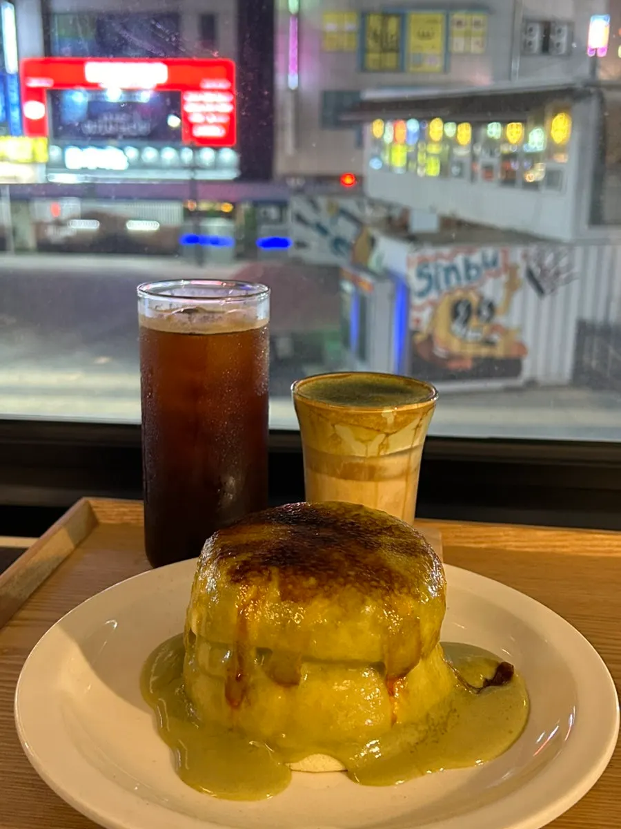 Matcha cream brûlée soufflé topped with sugar coating