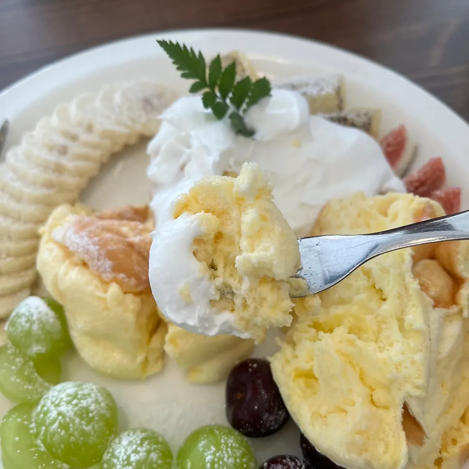A piece of soufflé pancake on a fork