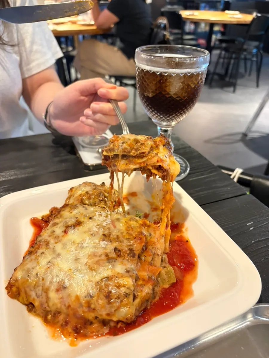 A cross-section of the lasagna, generously filled inside