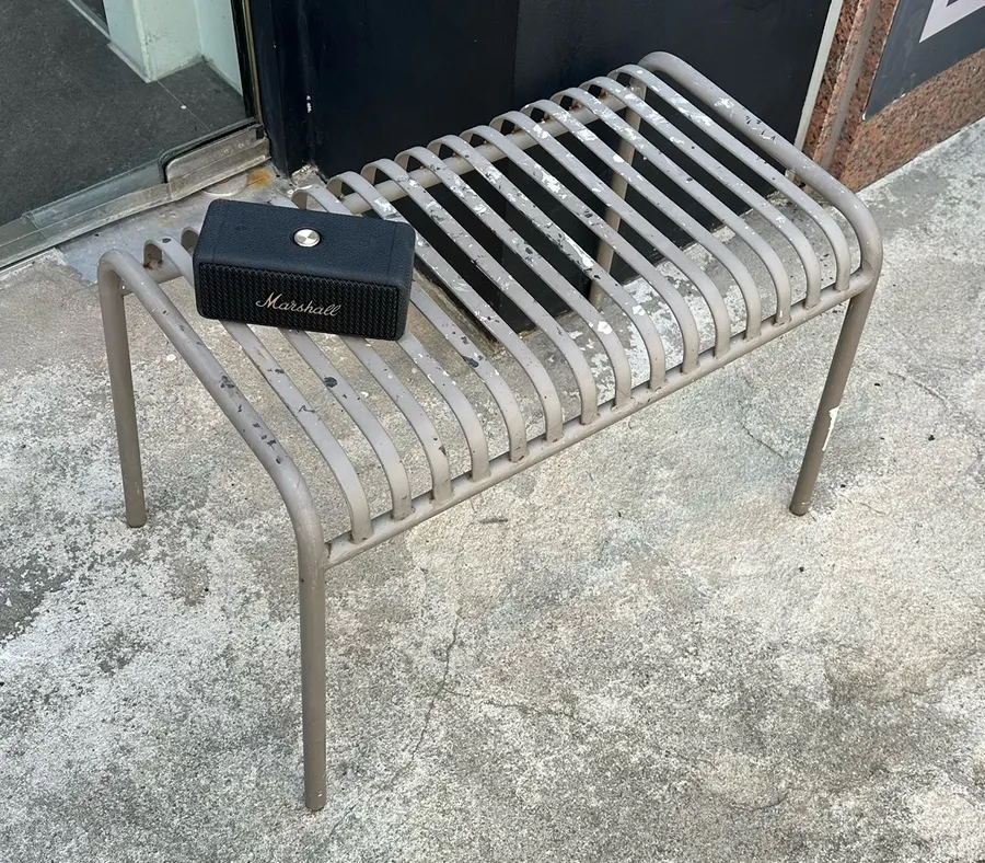 A speaker sitting on a terrace table