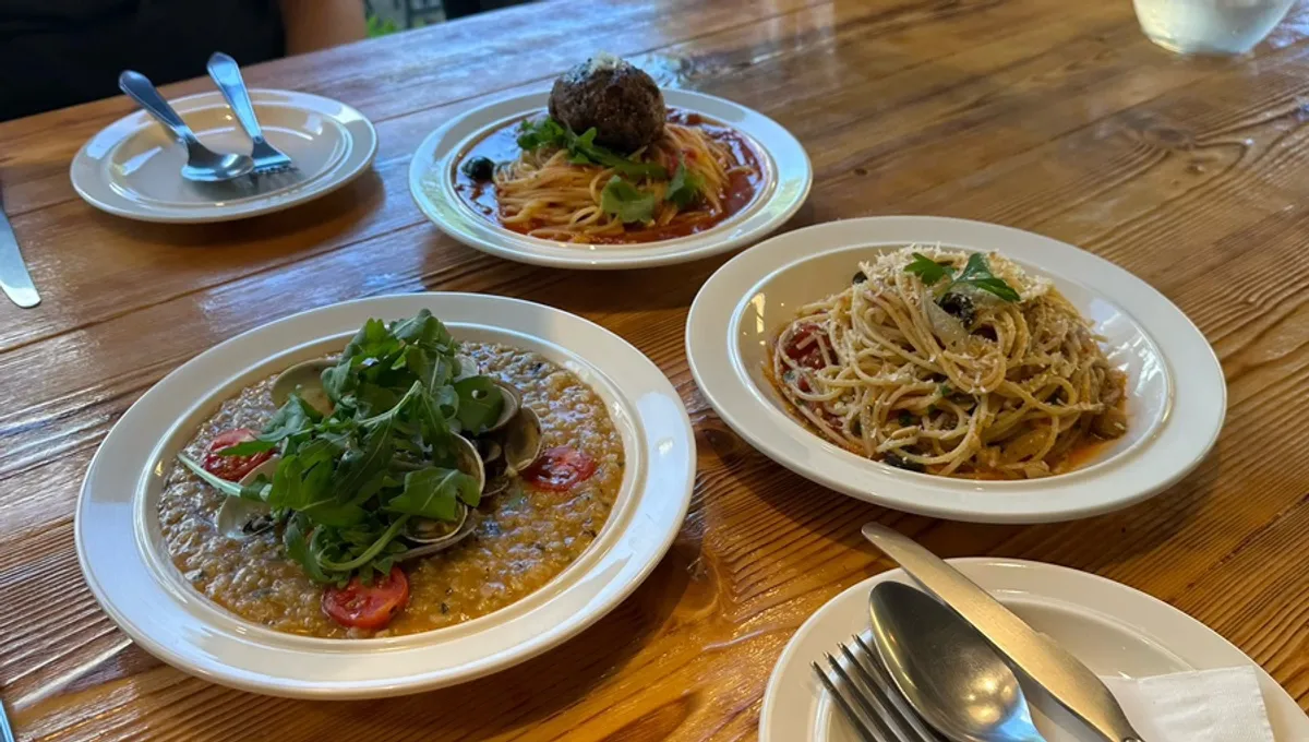 Risotto and two pasta plates served together