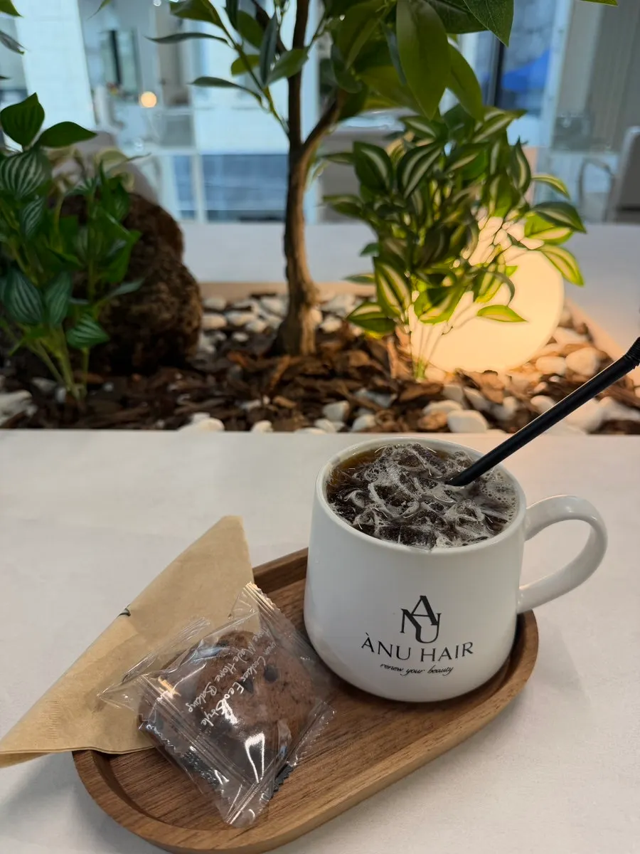 A cup of coffee served during the dye treatment