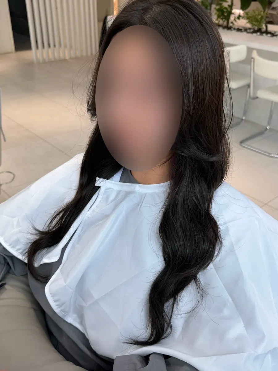 Brown hair tidied into one consistent tone after the tone-down dye