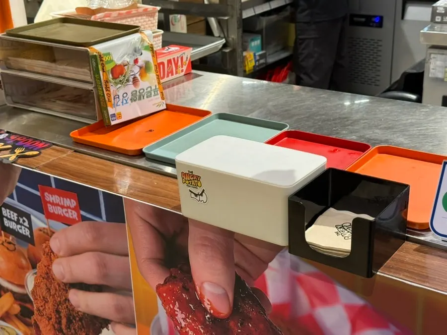 Sauce varieties lined up on the self-serve bar