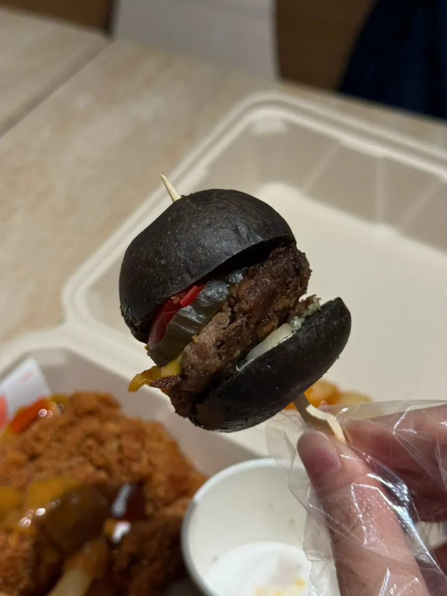 Mini burger and fries inside the box