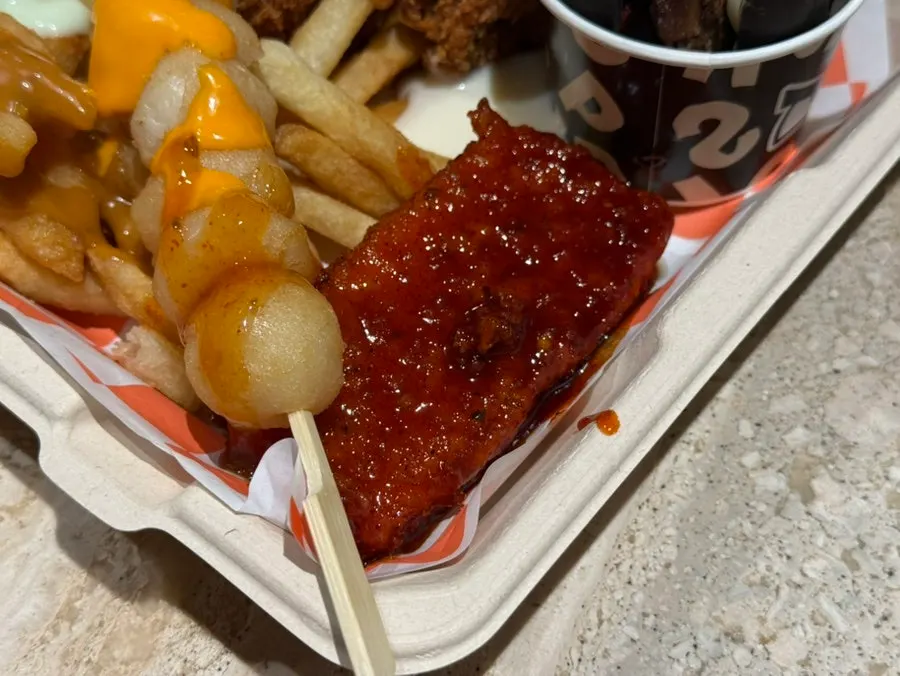 Chewy potatoes eaten with sriracha mayo