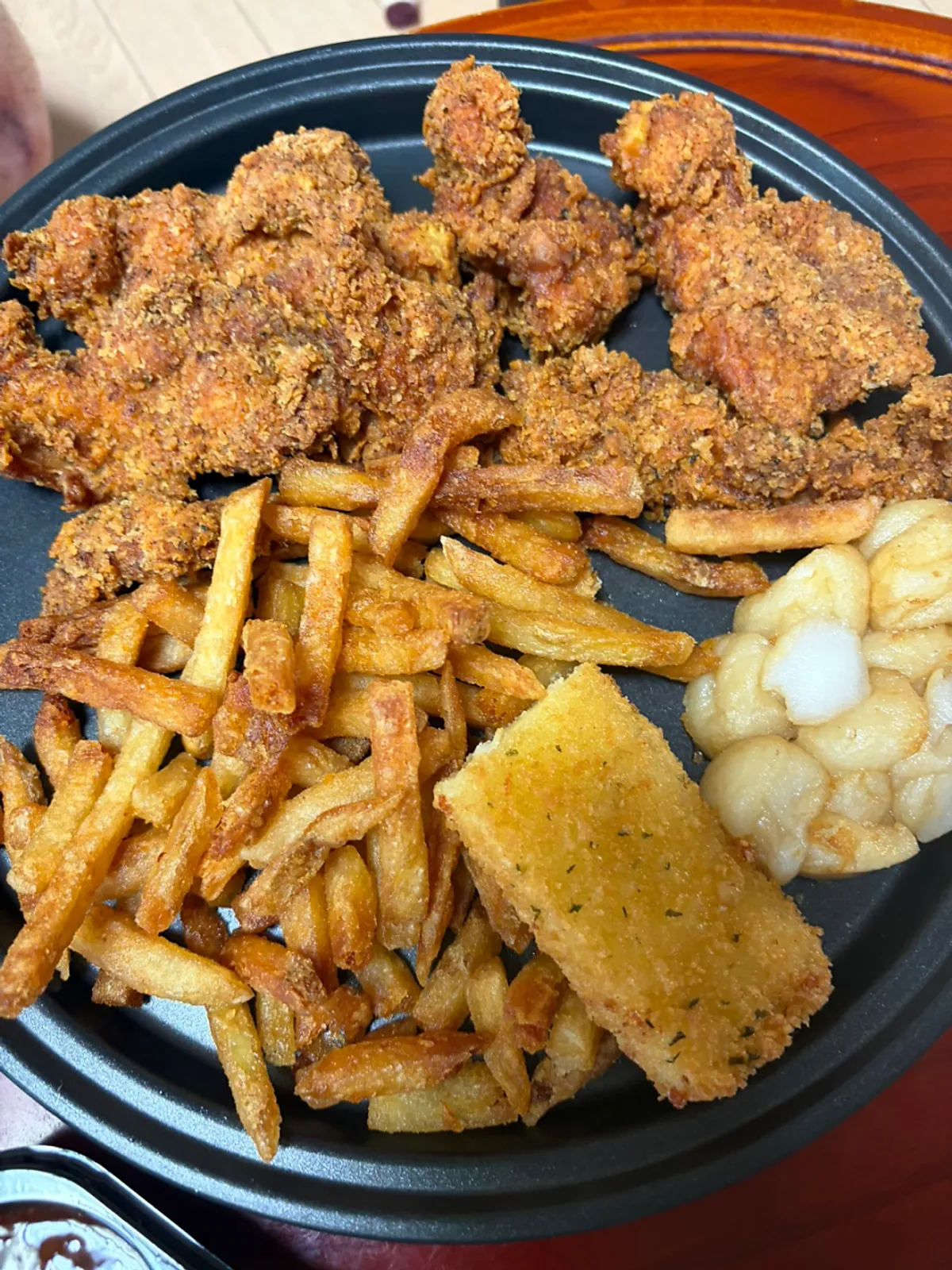Full spread of takeout fries and chicken